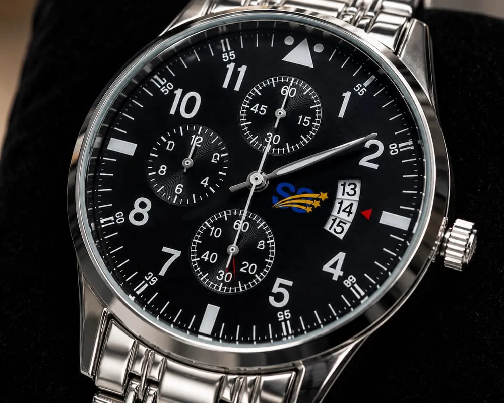 Close view of the black dial, its subdials and the date window
